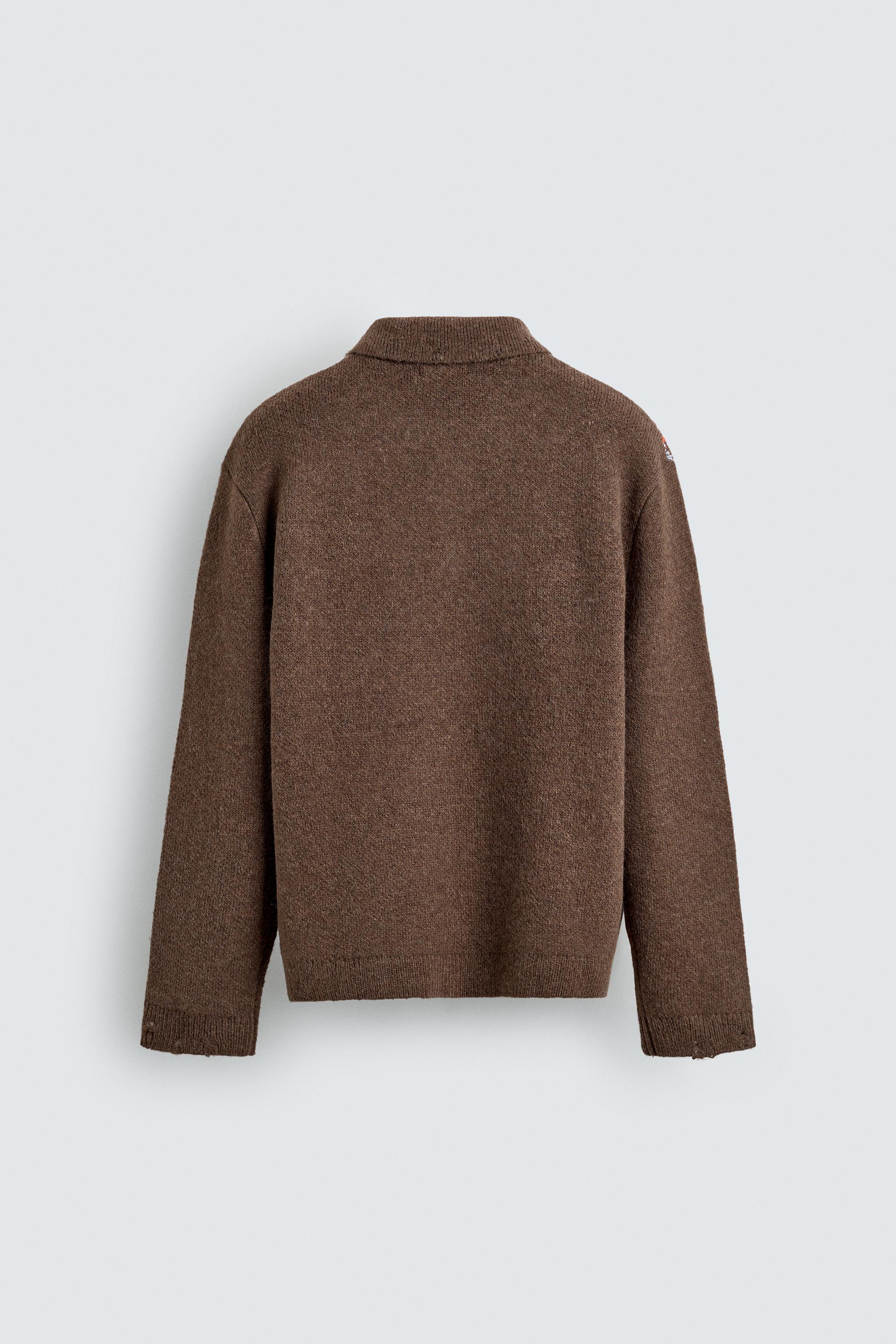 POLO EN MAILLE À LOSANGES EFFET DÉCHIRURES
